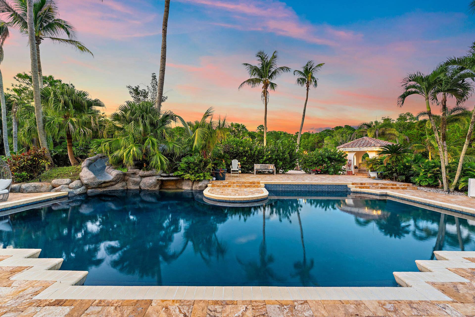2584 SE Ranch Acres Circle, Jupiter, FL 33478 Pool and Lake at Sunset
