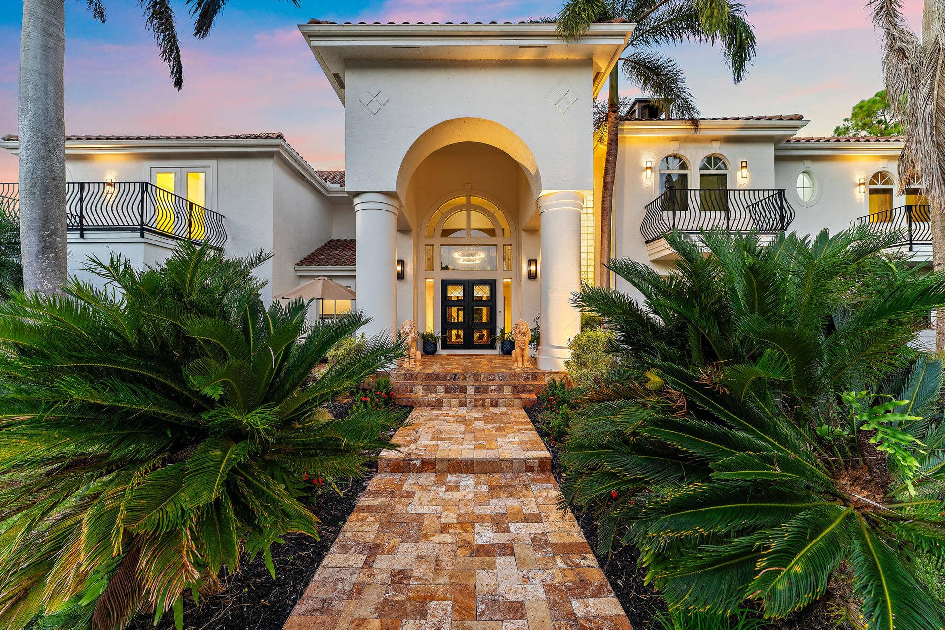 2584 SE Ranch Acres Circle, Jupiter, FL 33478 Grand Front Entry with Evening Glow