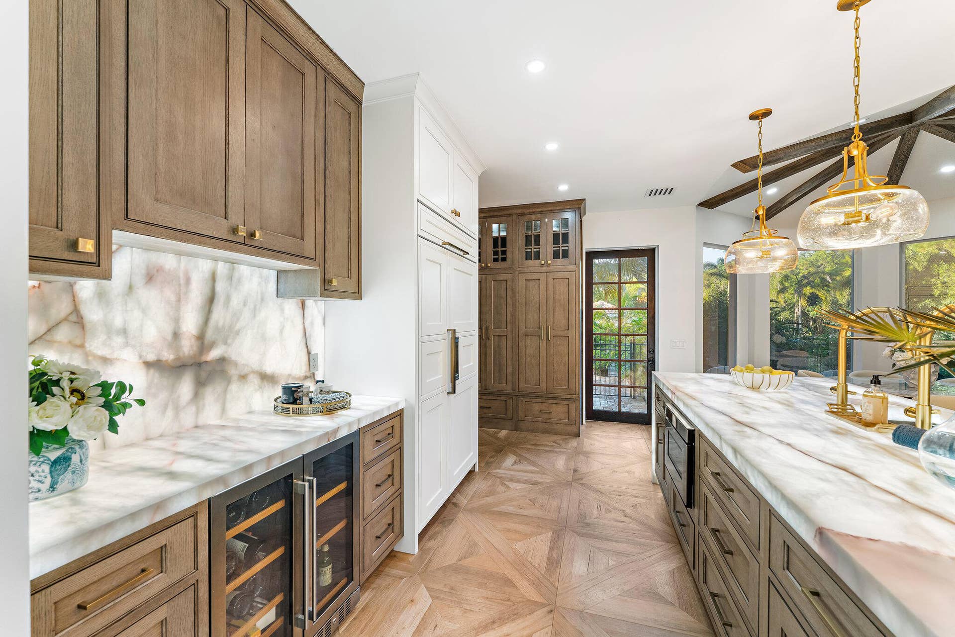 2584 SE Ranch Acres Circle, Jupiter, FL 33478 Kitchen with Warm Wood Detail
