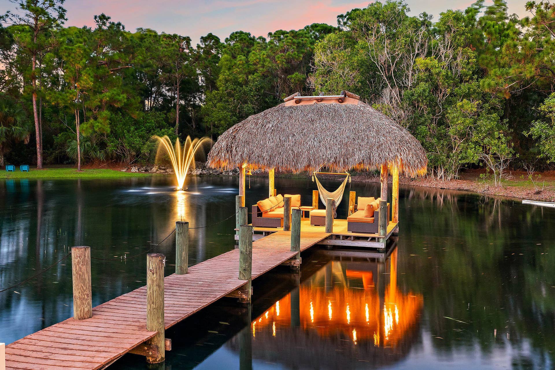 2584 SE Ranch Acres Circle, Jupiter, FL 33478 Private Dock at Twilight