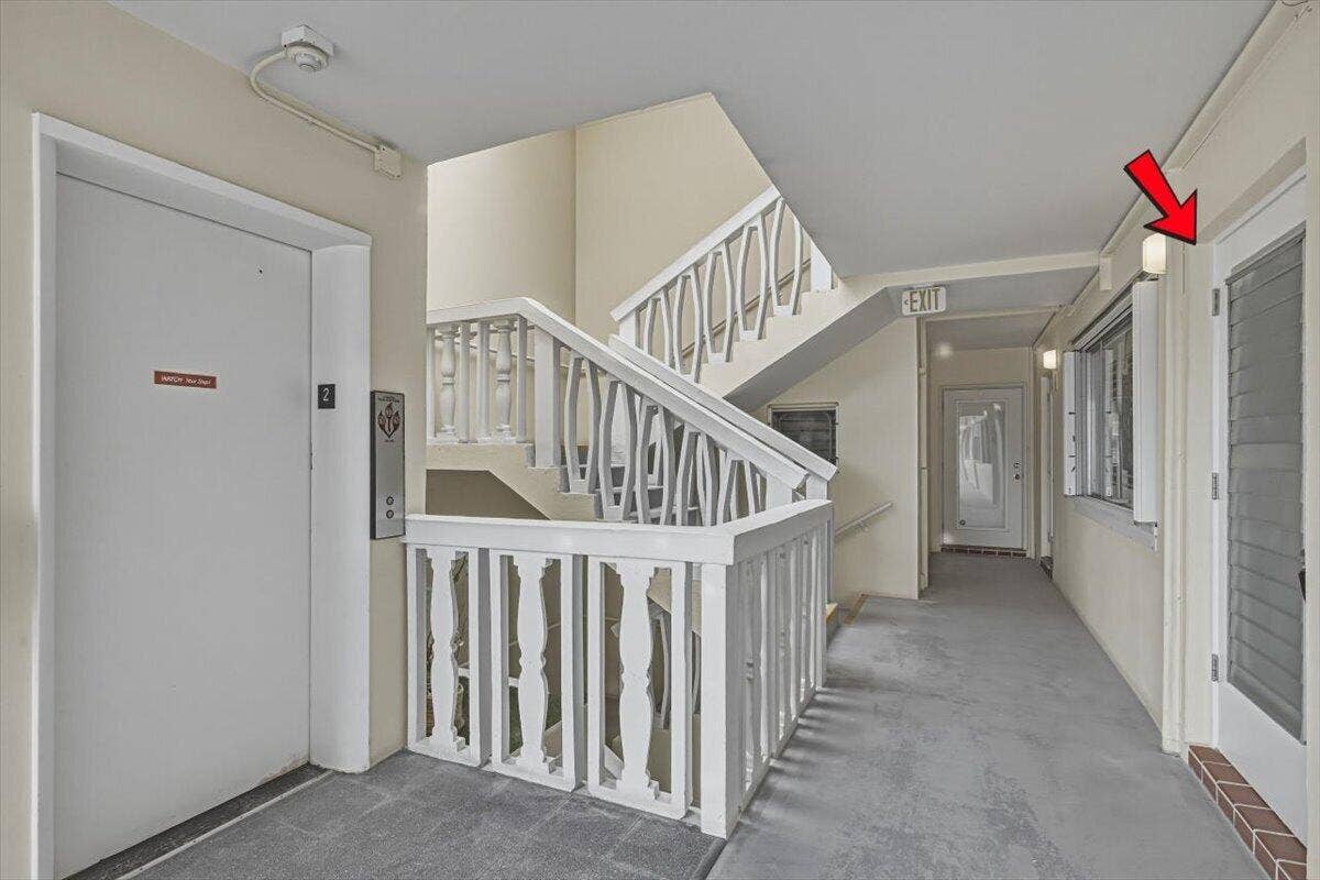 101 Doolen Court, #205, North Palm Beach, FL 33408 Front Door Entrance near Elevator