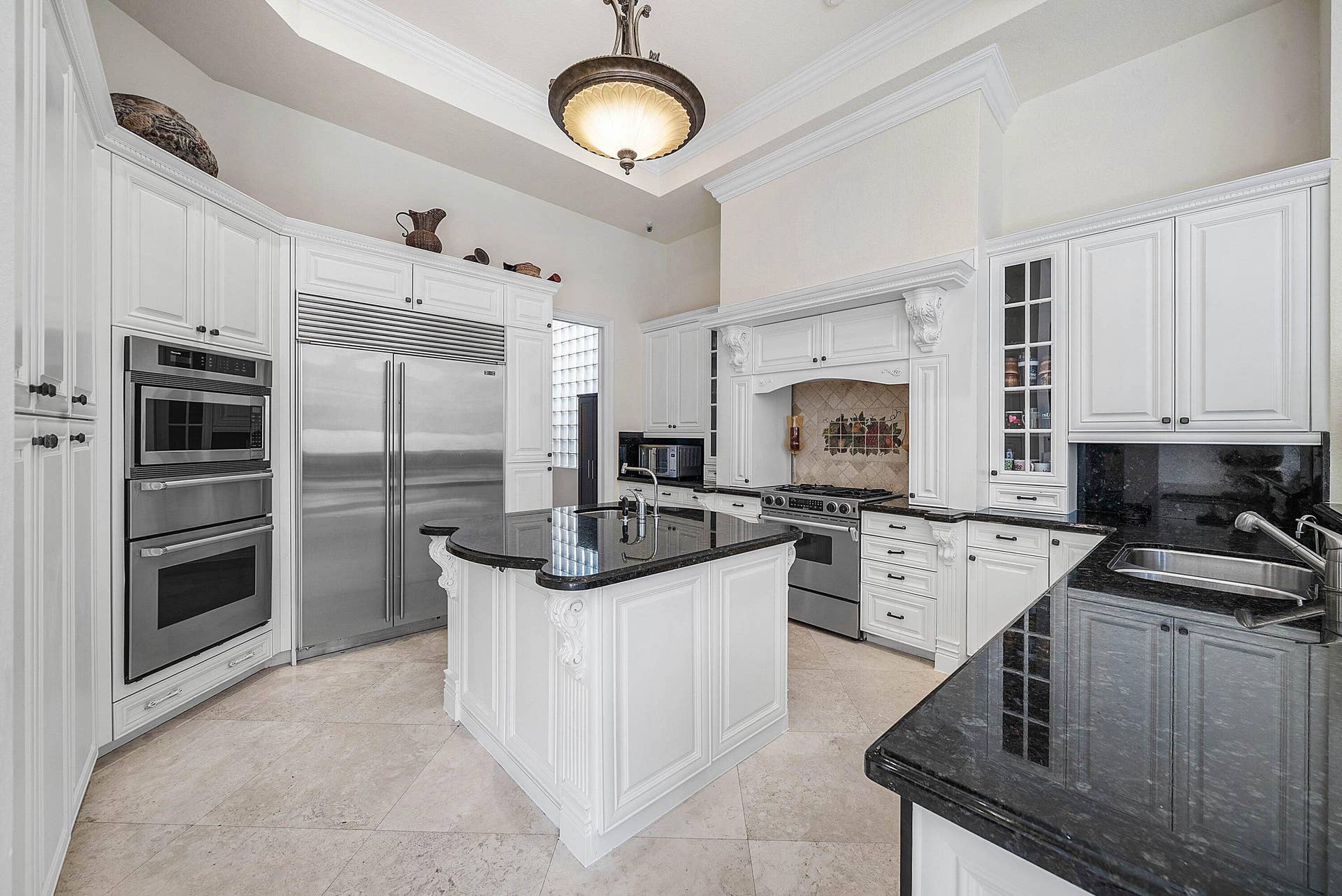 Gourmet Kitchen. Thermador Micro/Warming/Wall Oven, Sub Zero Fridge, Jenn Air Range, Marvel Wine Reserve