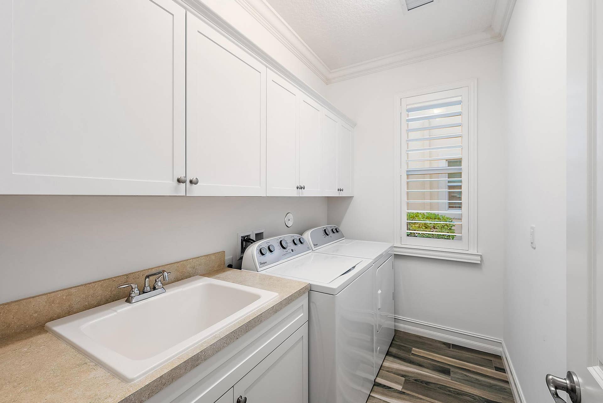Laundry room with mop sink
