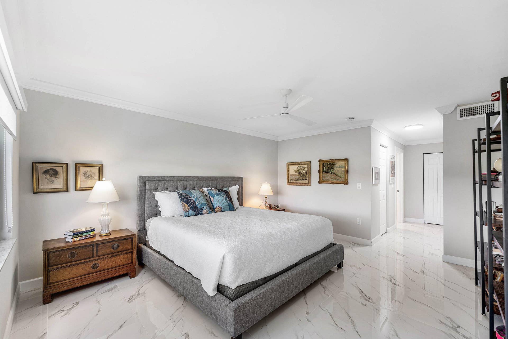 12 Stratford Drive E, #A, Boynton Beach, FL 33436 White tile flooring, crown molding, and recessed lighting