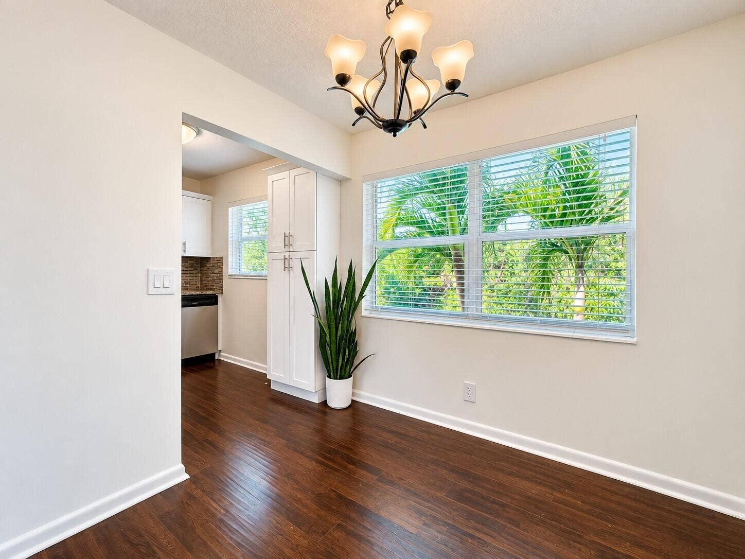 WOW! Gleaming Updated Flooring Throughout. Gorgeous Updated Kitchen. Impact Windows. Popcorn Removed from Ceilings. Water View