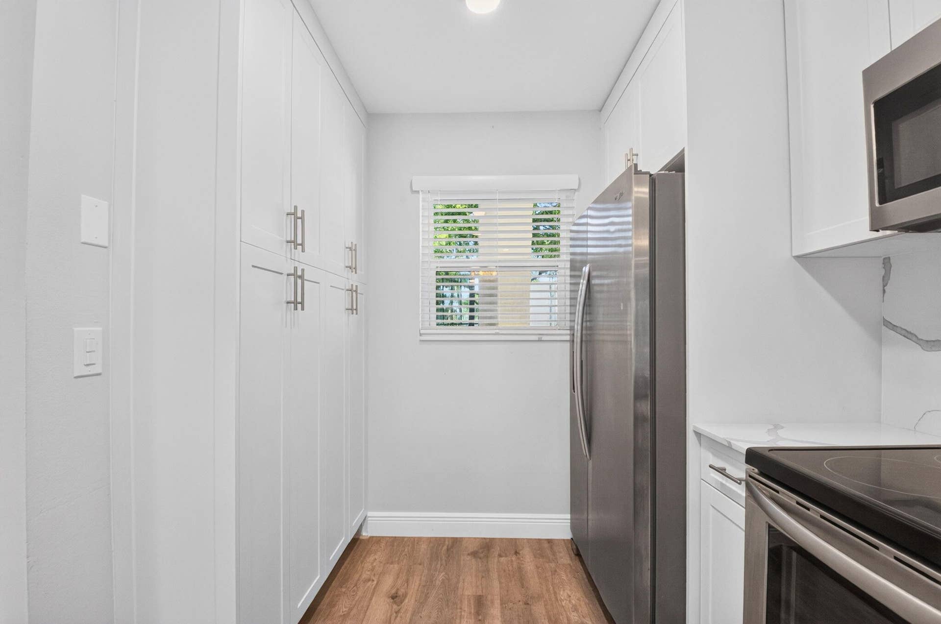 163 LAKE EVELYN Drive, West Palm Beach, FL 33411 Pantry Cabinet to the Left