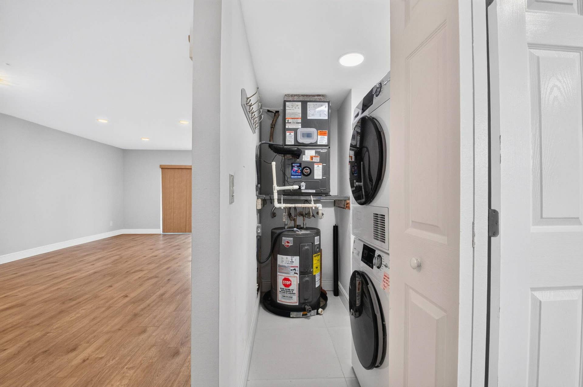 163 LAKE EVELYN Drive, West Palm Beach, FL 33411 Laundry/ Maintenance Closet- Brand New Washer/ Dryer (2026) W/H (2023)