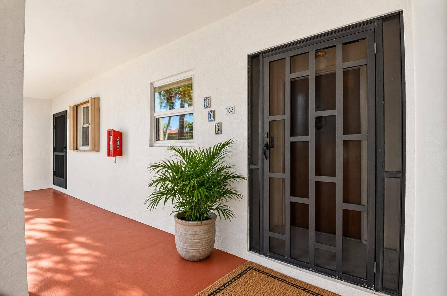 163 LAKE EVELYN Drive, West Palm Beach, FL 33411 1st Floor Corner Unit, Small Screened Entry, Assigned Parking, In Unit , Laundry