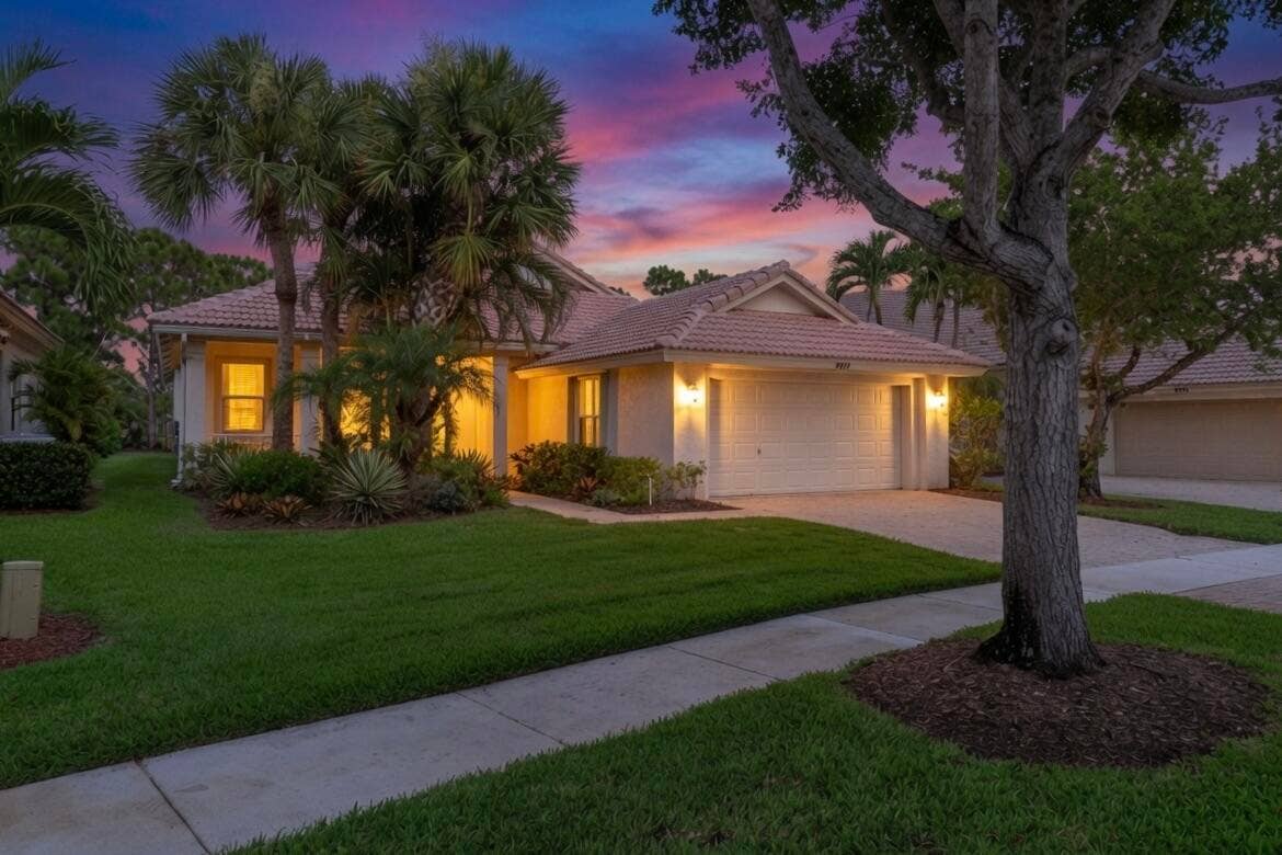 9110 Bay Harbour Circle, West Palm Beach, FL 33411 Front left Twilight