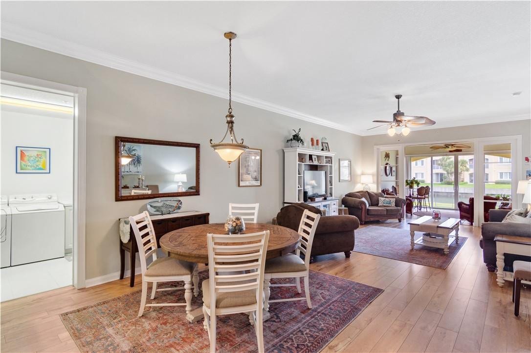 Beautiful wide-planked vinyl flooring throughout, volume crown molding, and new HVAC.