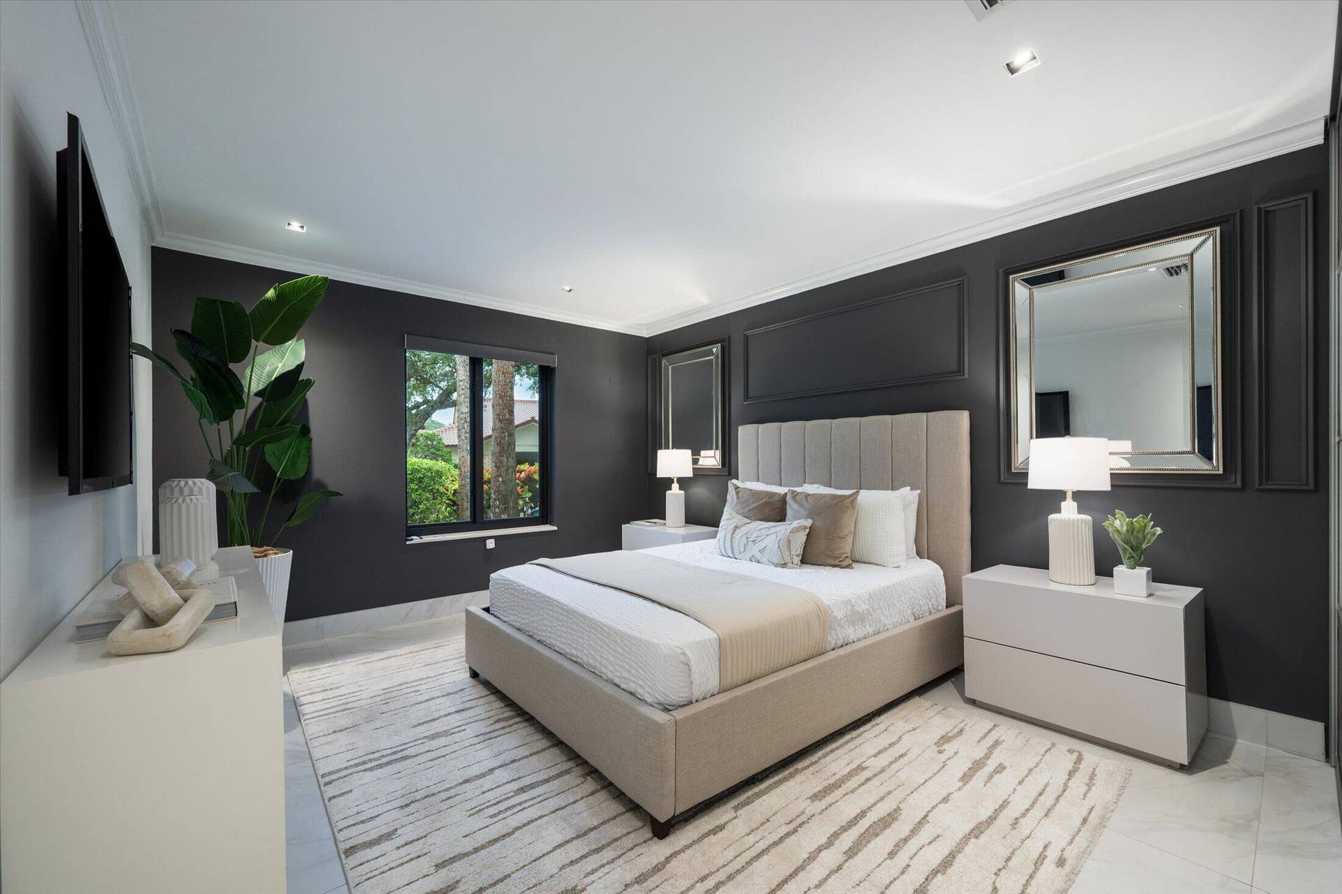 2890 ANTIETAM Lane, West Palm Beach, FL 33409 Recessed lighting, crown molding, a window with exterior views, and a paneled accent wall