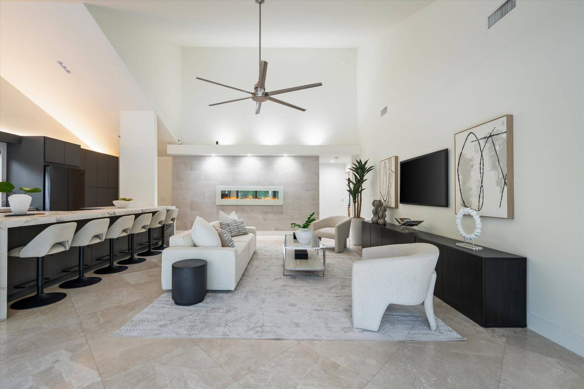 2890 ANTIETAM Lane, West Palm Beach, FL 33409 Vaulted ceiling, ceiling fan, built-in electric fireplace, recessed lighting, and tile flooring