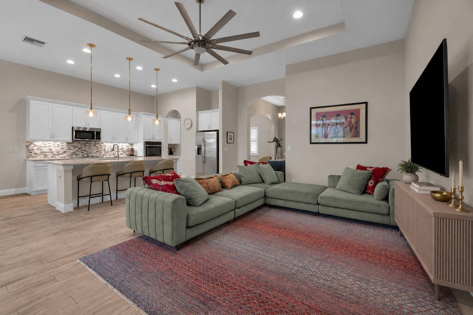Modern Sage Living Room with Open Kitche