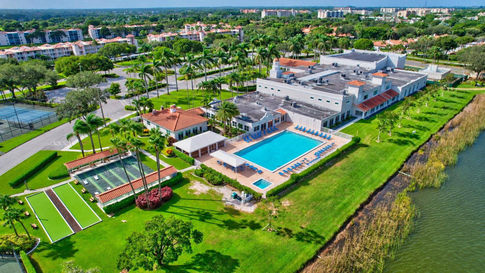 6065 Pointe Regal Circle, #403, Delray Beach, FL 33484 01_aerial_community_amenities_no_cars