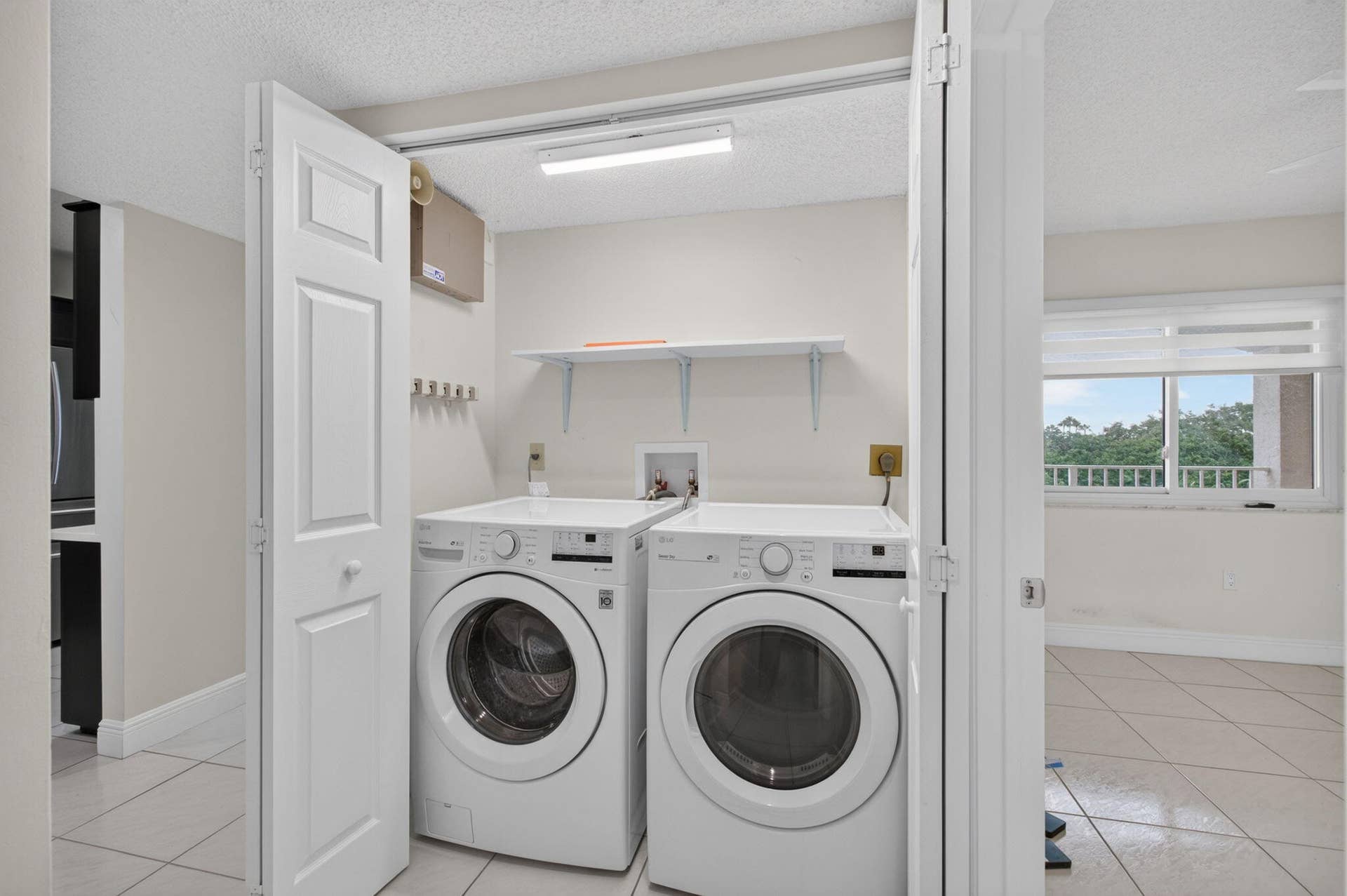 6065 Pointe Regal Circle, #403, Delray Beach, FL 33484 16_Laundry