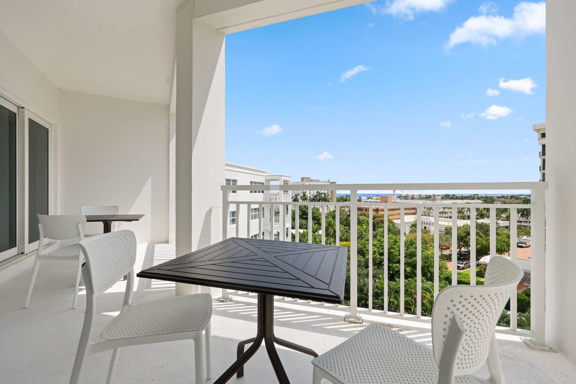 A coveted glimpse of the Atlantic reminds you just how close this exceptional residence is to the beach.