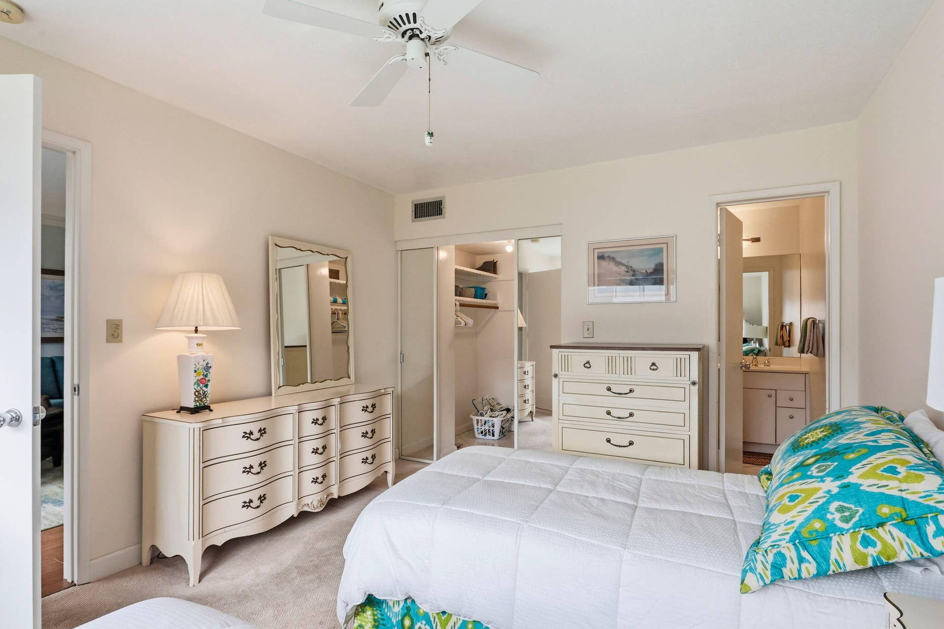 1198 Hillsboro Mile, #210, Hillsboro Beach, FL 33062 Recessed closet with built-in shelving, ceiling fan, and carpeted flooring