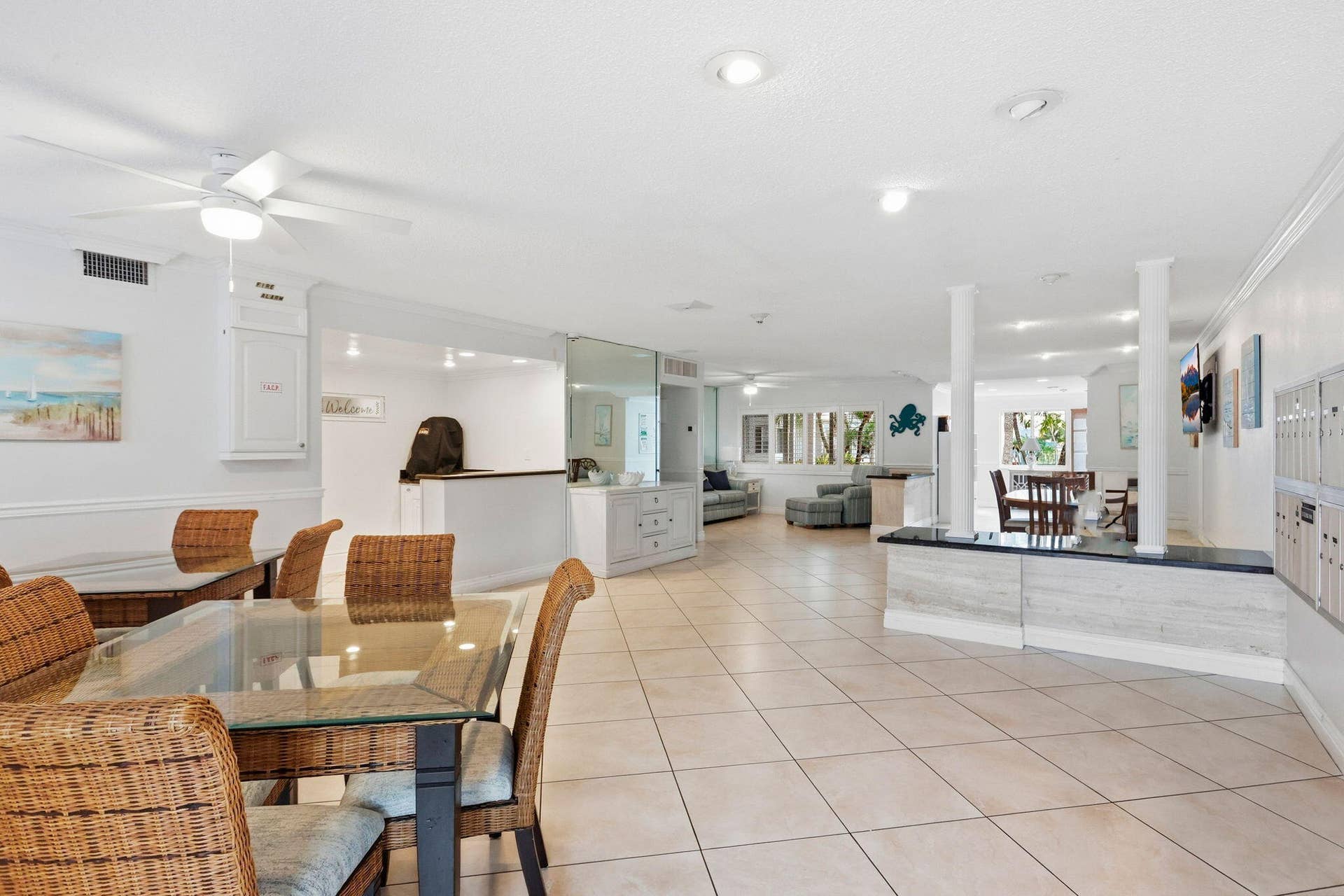 1198 Hillsboro Mile, #210, Hillsboro Beach, FL 33062 Expansive tiled flooring throughout, featuring recessed lighting and ceiling fans