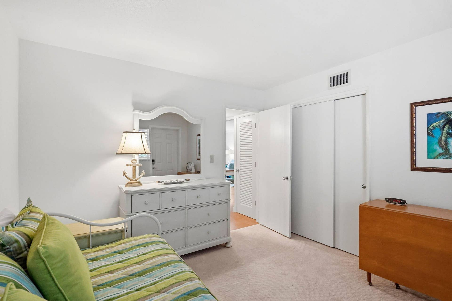 1198 Hillsboro Mile, #210, Hillsboro Beach, FL 33062 White wall finishes, carpeted flooring, and a mirrored dresser