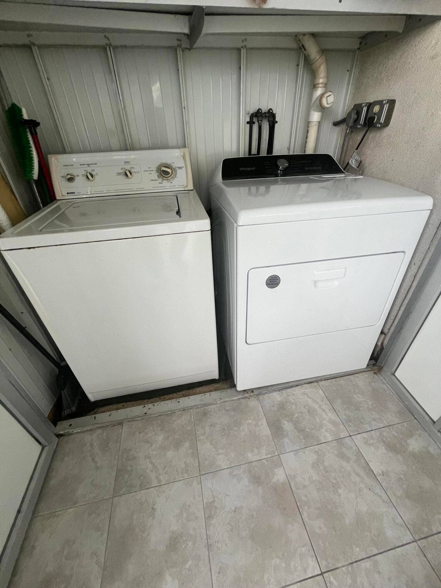 full sized side by side washer/dryer in patio utility closet