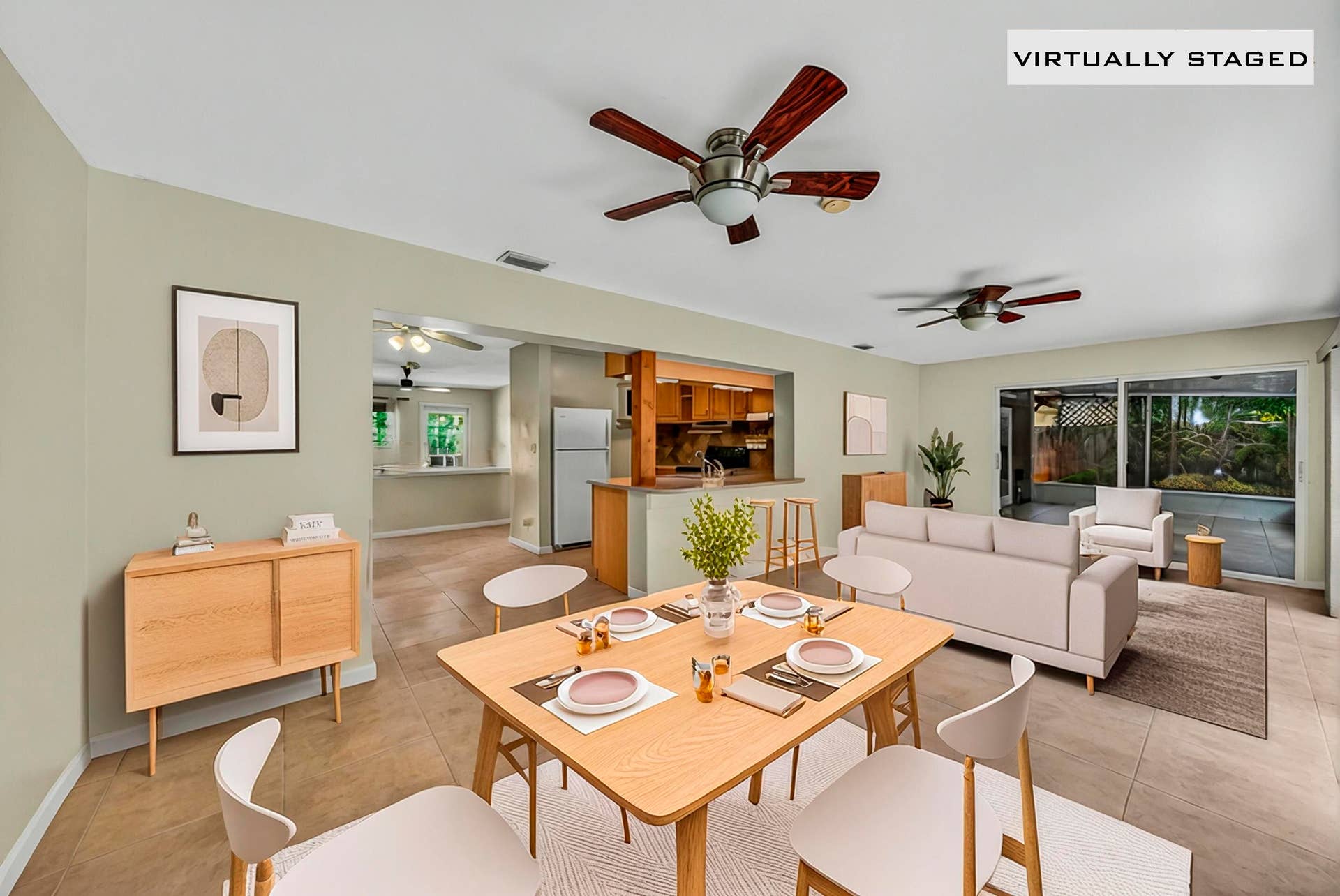 1540 NE 40th Street, Oakland Park, FL 33334 living dining staged