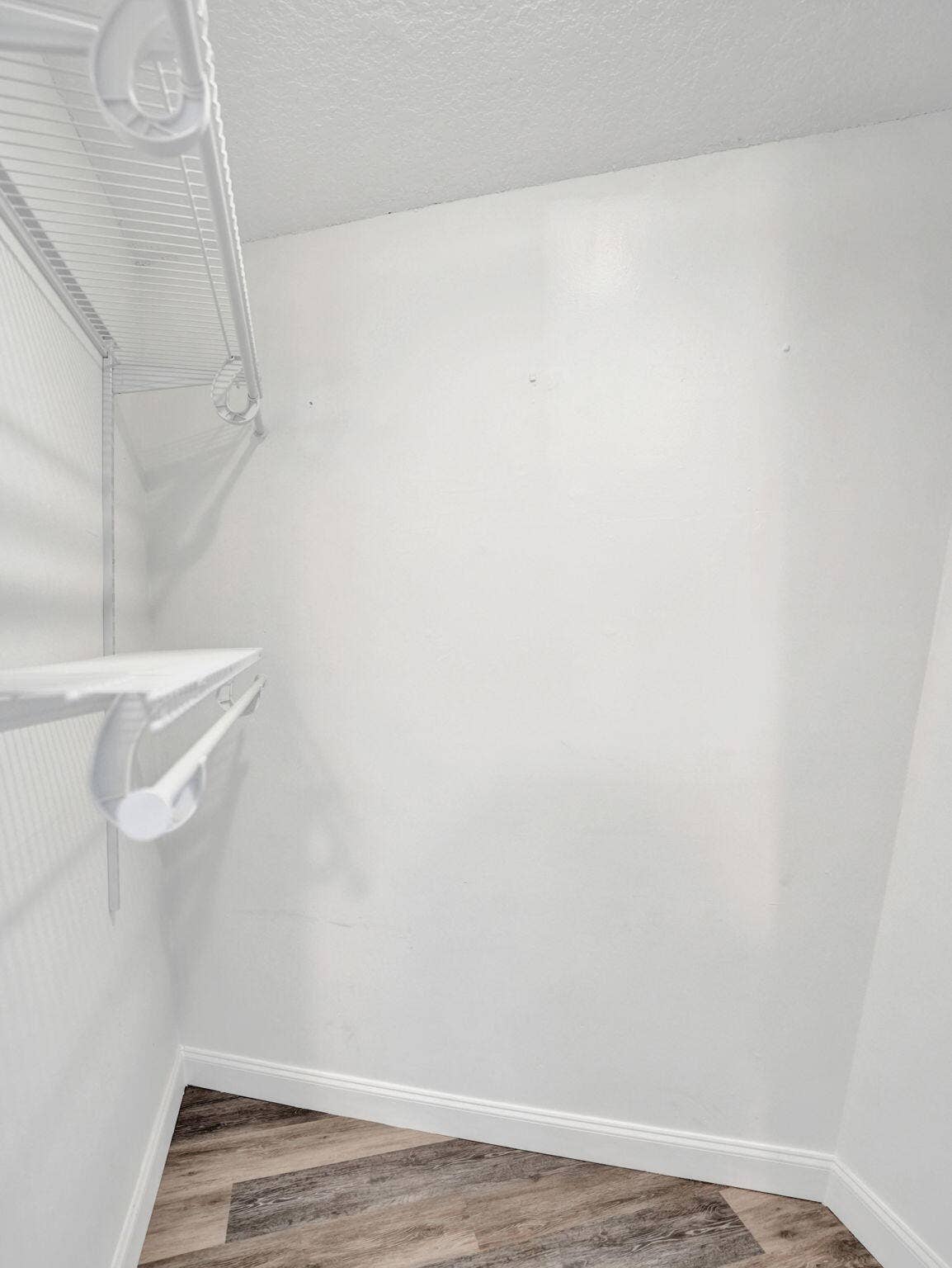 Wood-finish flooring and wire shelving