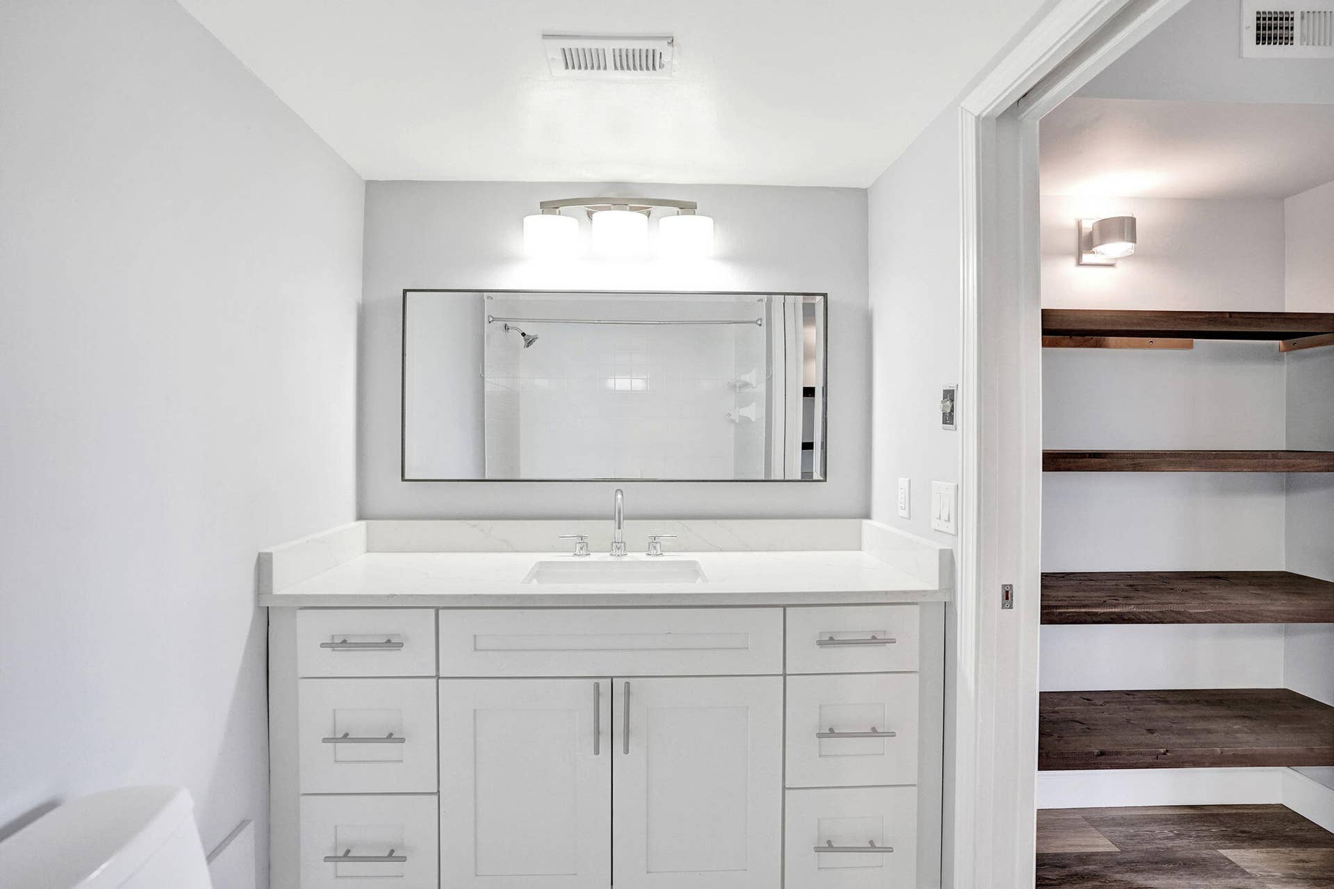 White vanity with plenty of storage space
