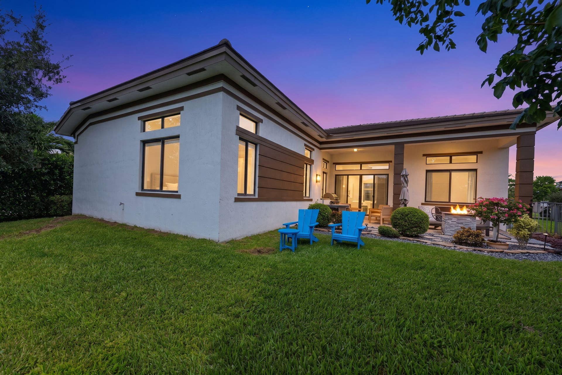 10490 S Lago Vista Circle, Parkland, FL 33076 10-web-or-mls-Back Yard Twilight