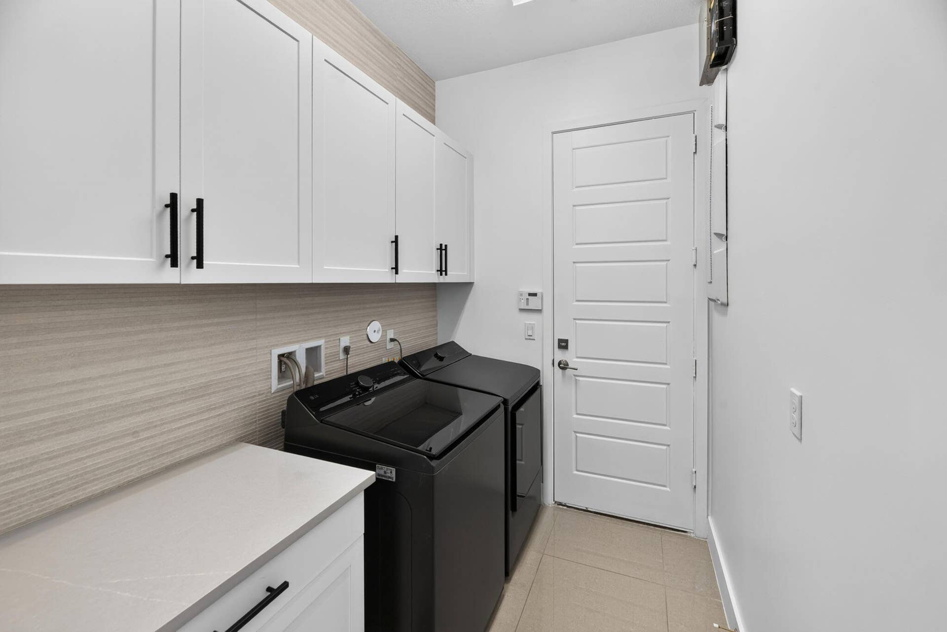 10490 S Lago Vista Circle, Parkland, FL 33076 Laundry Room