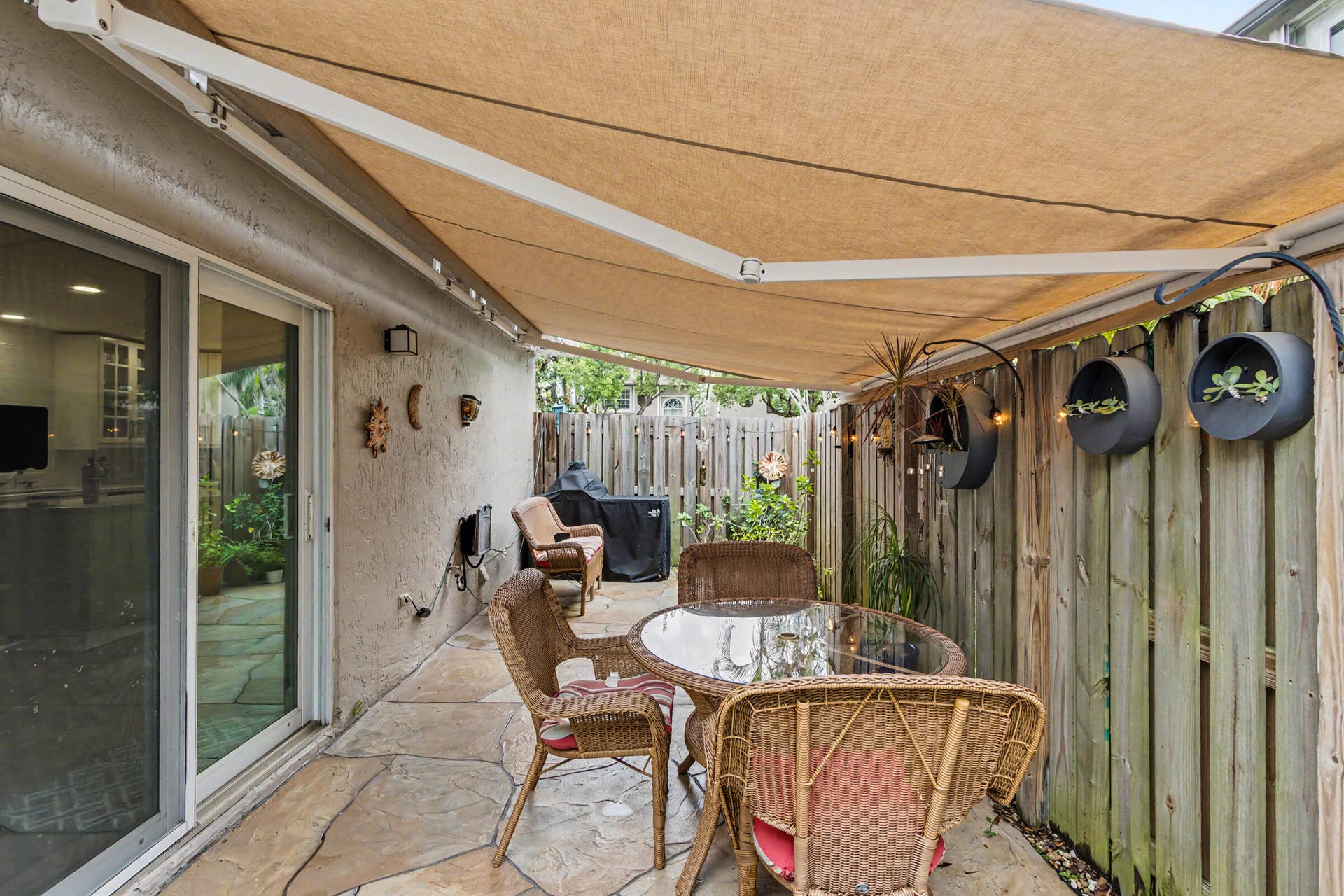 Retractable shade awning with misters to keep cool