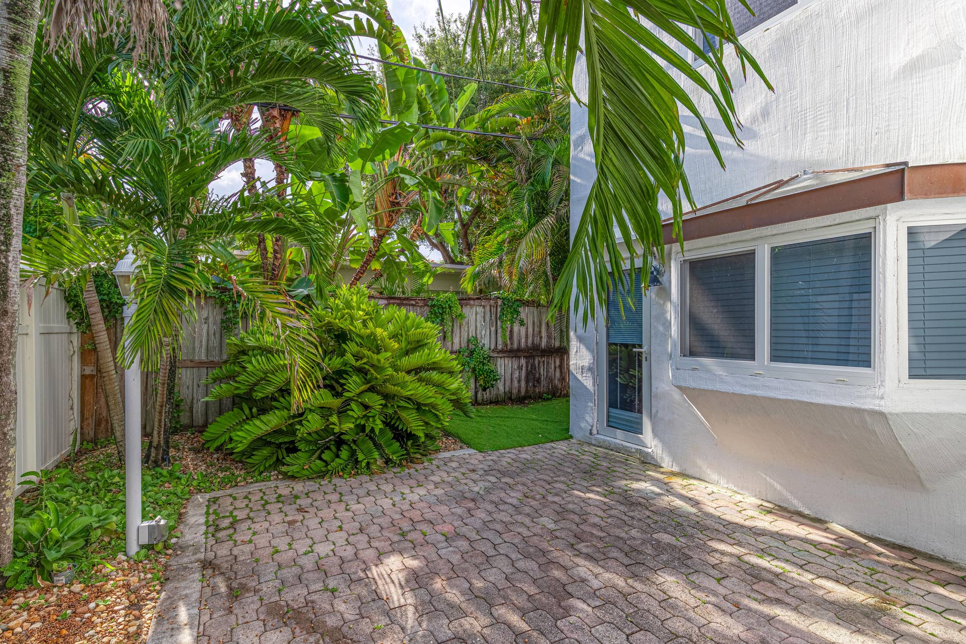 110 NE 16th Terrace, #1-3, Fort Lauderdale, FL 33301 Courtyard with 2 entry doors. All impact windows and doors.