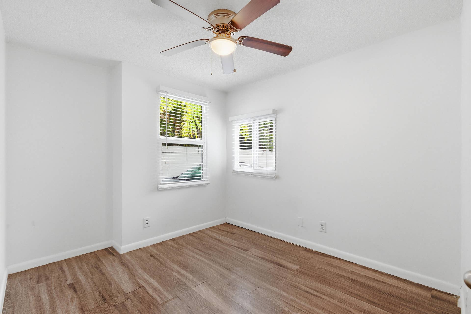 110 NE 16th Terrace, #1-3, Fort Lauderdale, FL 33301 1st floor bedroom with vinyl peel and stick over ceramic tile.
