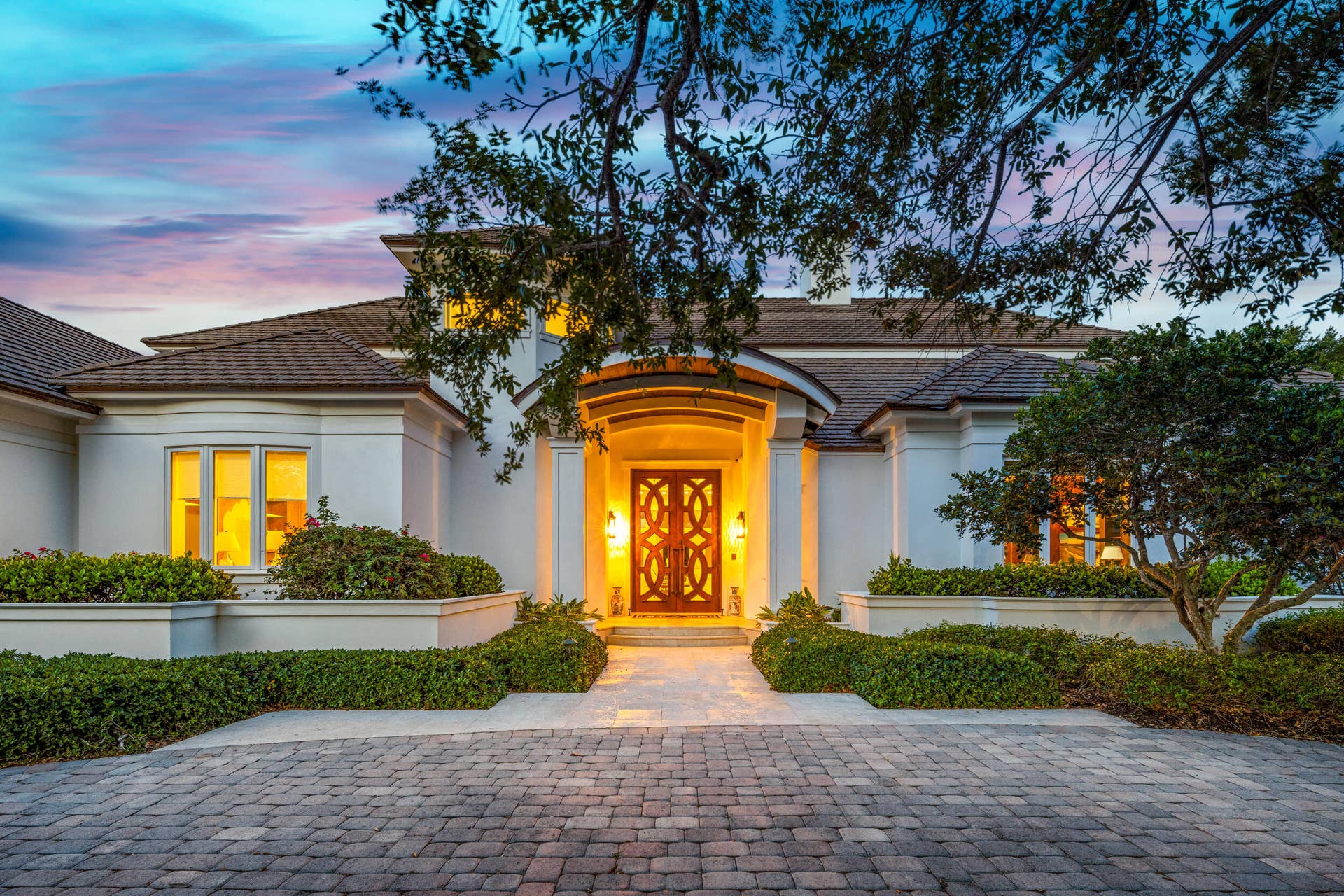 17965 SE VILLAGE Circle, Tequesta, FL 33469 Front Exterior Twilight