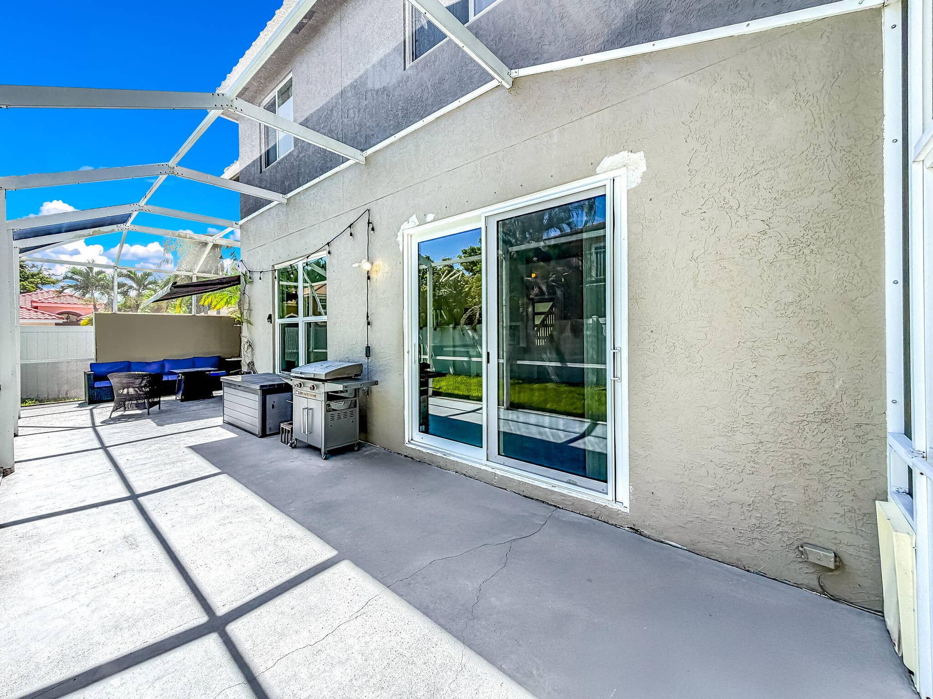 18980 CONCERTO Drive, Boca Raton, FL 33498 Screened patio enclosure with concrete flooring