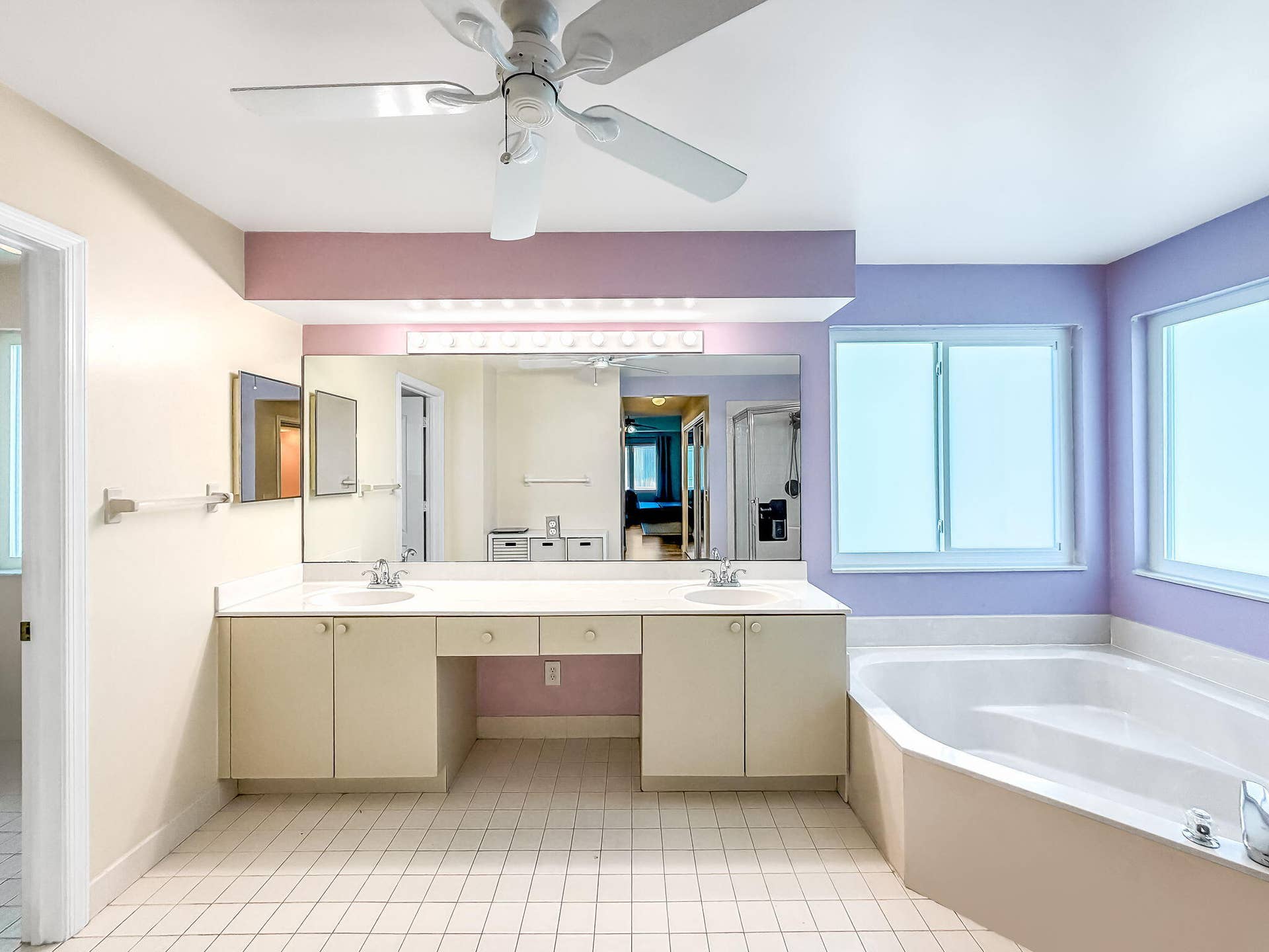 18980 CONCERTO Drive, Boca Raton, FL 33498 Dual vanity with integrated sinks, built-in cabinetry, and a dedicated makeup area