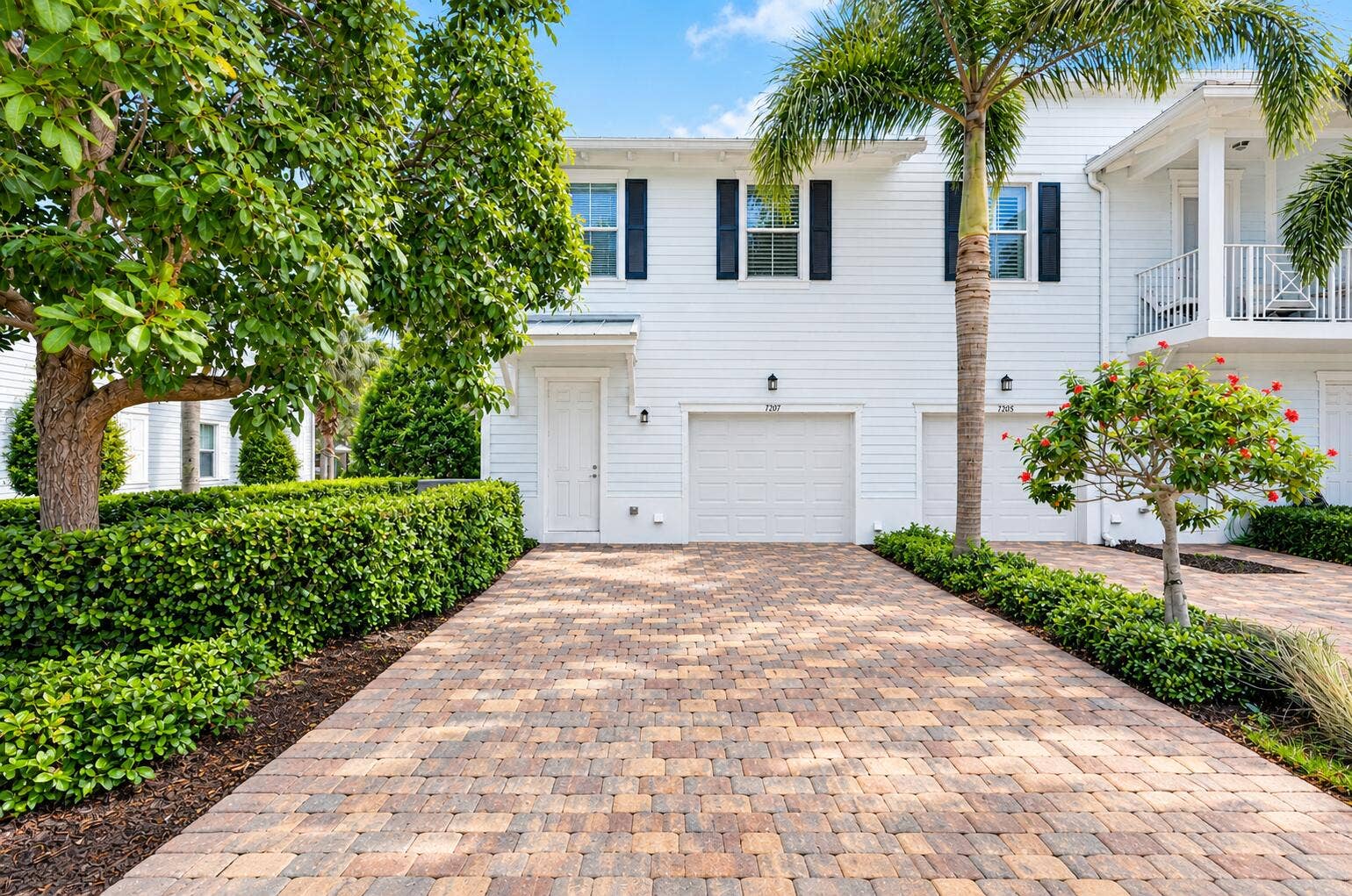 1201 DAKOTA Drive, Jupiter, FL 33458 Back Exterior With Garage