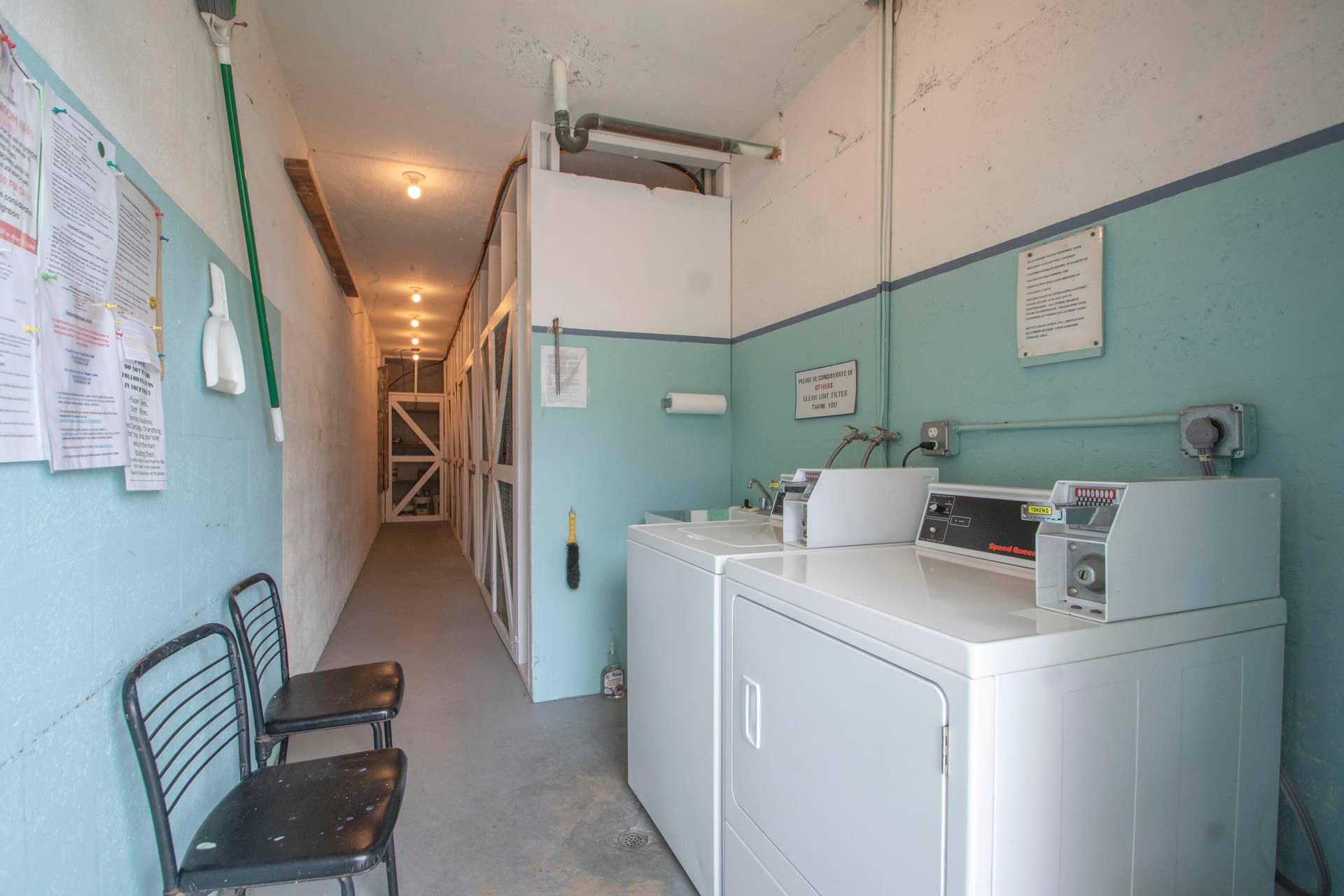 2800 Indian River Boulevard, #O-5, Vero Beach, FL 32960 Laundry Room with locked storage in the rear