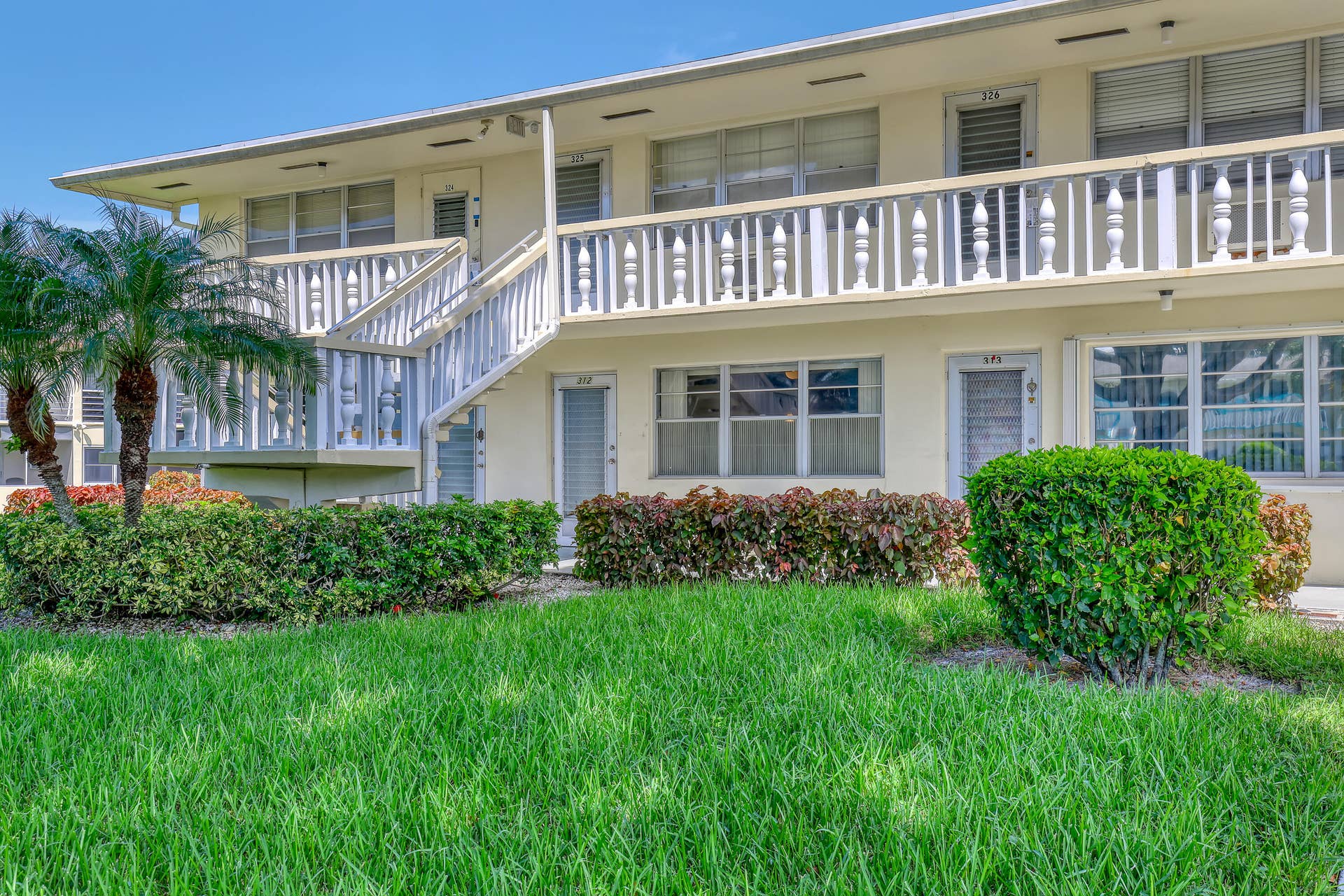 A well-kept community setting with convenient access to your front door