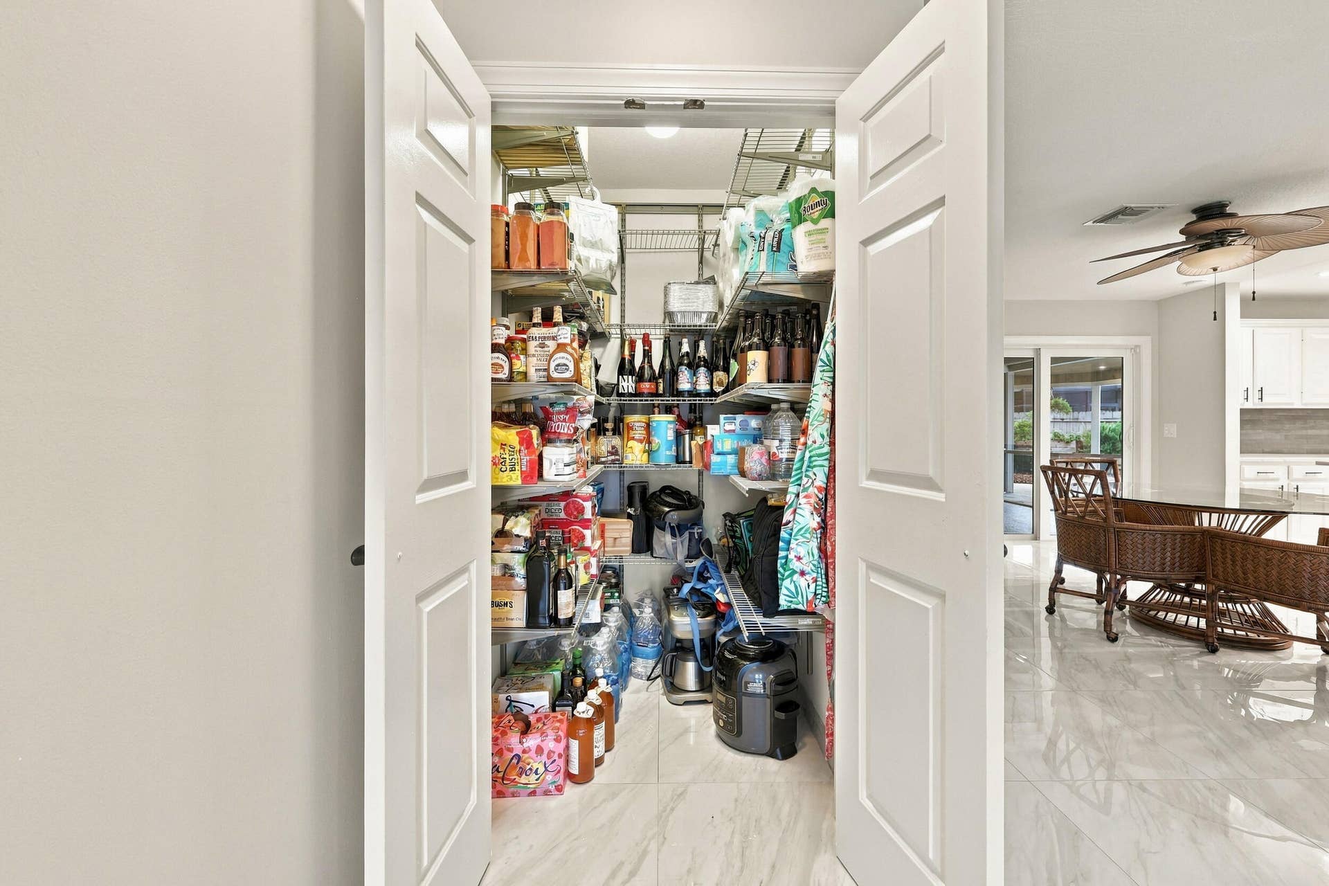 3590 Lakeview Drive, Delray Beach, FL 33445 There is no shortage of storage in this home. Along with all of the kitchen cabinetry comes this walk-in pantry for all of your chef-inspired needs.