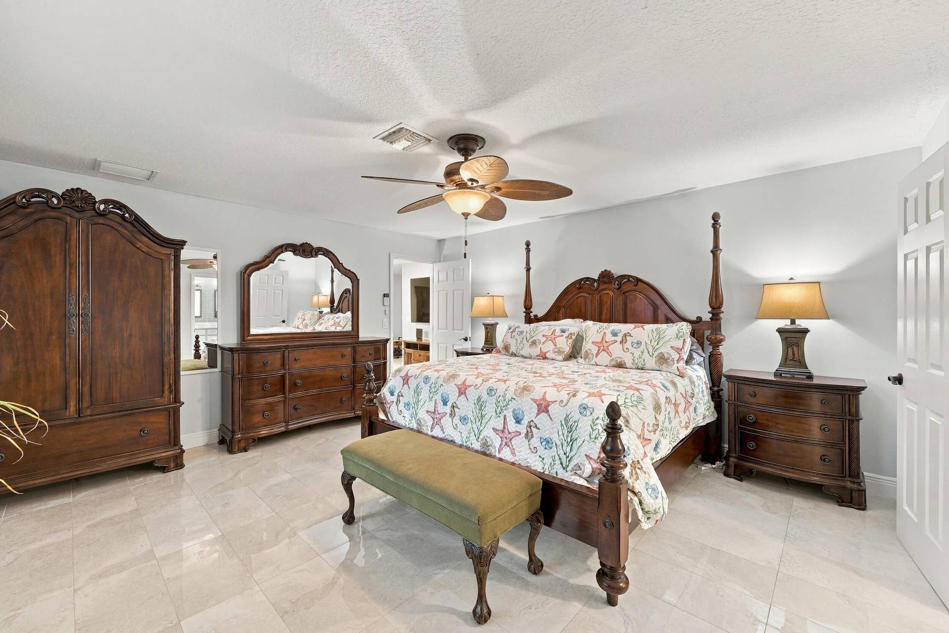 3590 Lakeview Drive, Delray Beach, FL 33445 The primary suite has everything you have been looking for: spacious and elegant, with a walk-in closet, a fully updated en-suite bathroom, and lots of natural light.