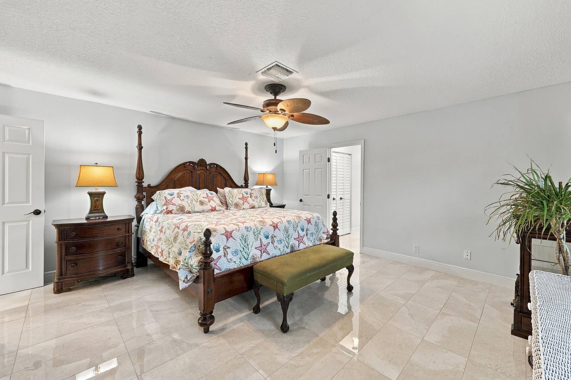 3590 Lakeview Drive, Delray Beach, FL 33445 The primary suite has everything you have been looking for: spacious and elegant, with a walk-in closet, a fully updated en-suite bathroom, and lots of natural light.