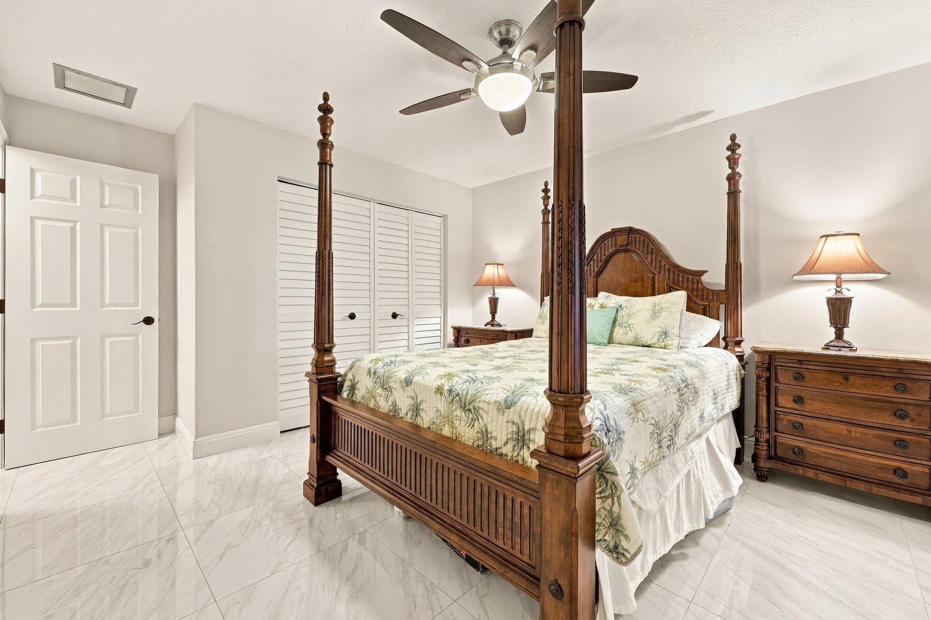 3590 Lakeview Drive, Delray Beach, FL 33445 Guest bedroom 3 offers lots of natural light through a hurricane impact glass window and lots of closet space.