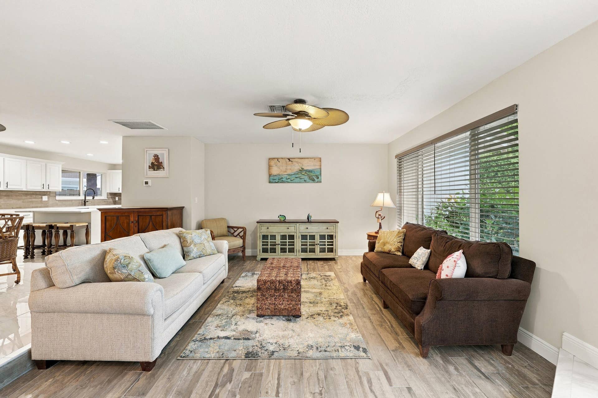3590 Lakeview Drive, Delray Beach, FL 33445 A spacious and versatile floor plan offers a formal living area that flows nicely into the updated kitchen and then into a family or bonus room. Everything revolves around the pool, the resort-style pool, and the 900-square-foot covered, screened-in patio.