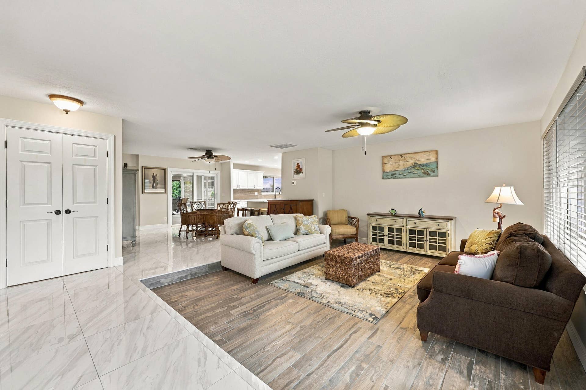 3590 Lakeview Drive, Delray Beach, FL 33445 A spacious and versatile floor plan offers a formal living area that flows nicely into the updated kitchen and then into a family or bonus room. Everything revolves around the pool, the resort-style pool, and the 900-square-foot covered, screened-in patio.
