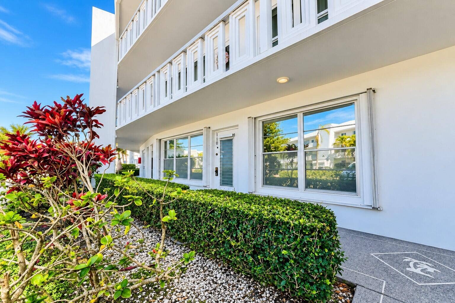 Spacious First Floor CORNER 2/2 In The Luxury Section Featuring Extra Storage, Trash Chutes, Wellington Section, New Roof (2024), and Access to the Two Private Pools for Wellington Residents