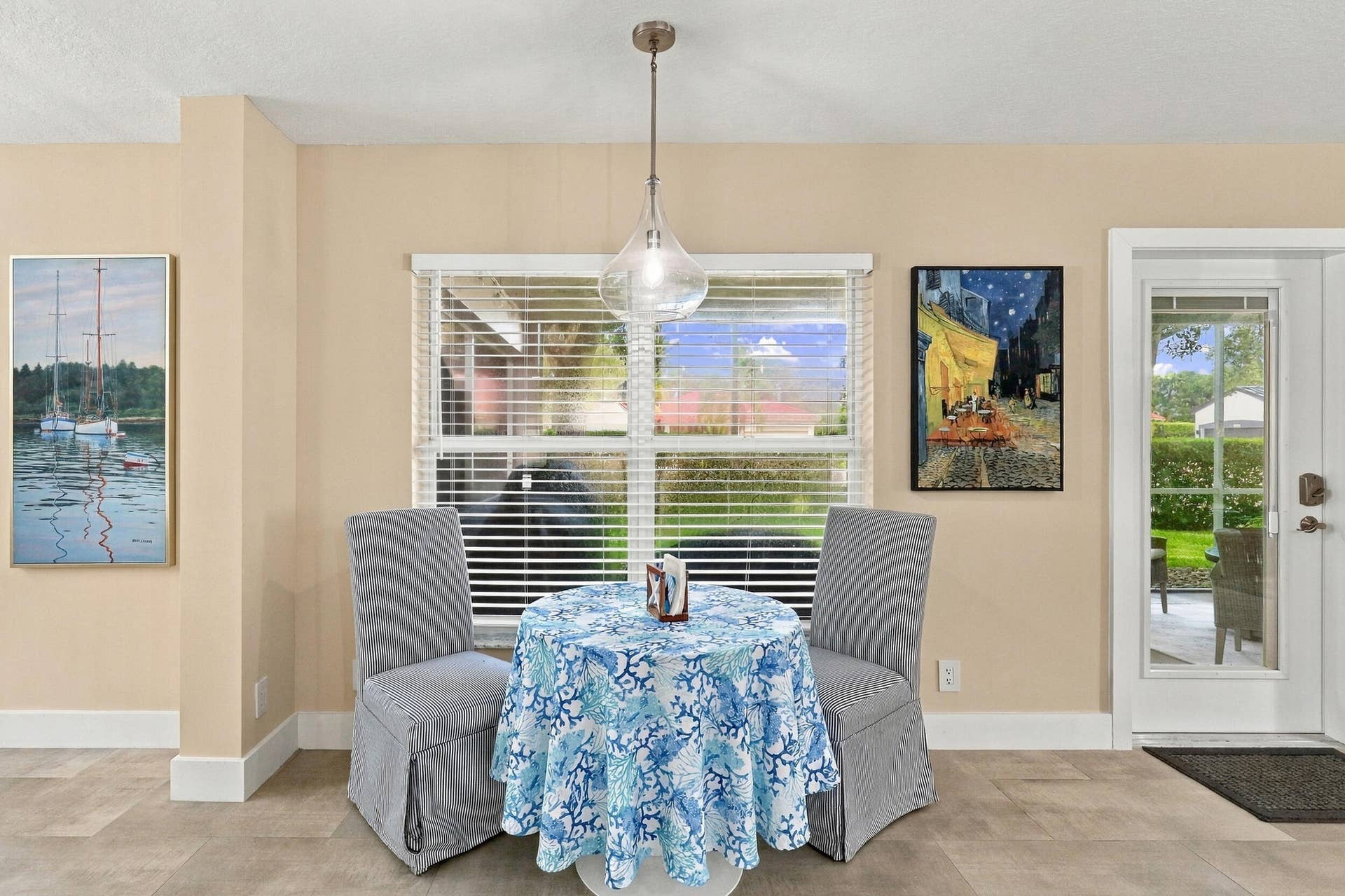 1434 Artimino Lane, Boynton Beach, FL 33436 The breakfast nook is a cute, informal space to take in a quick meal underneath a designer light fixture.