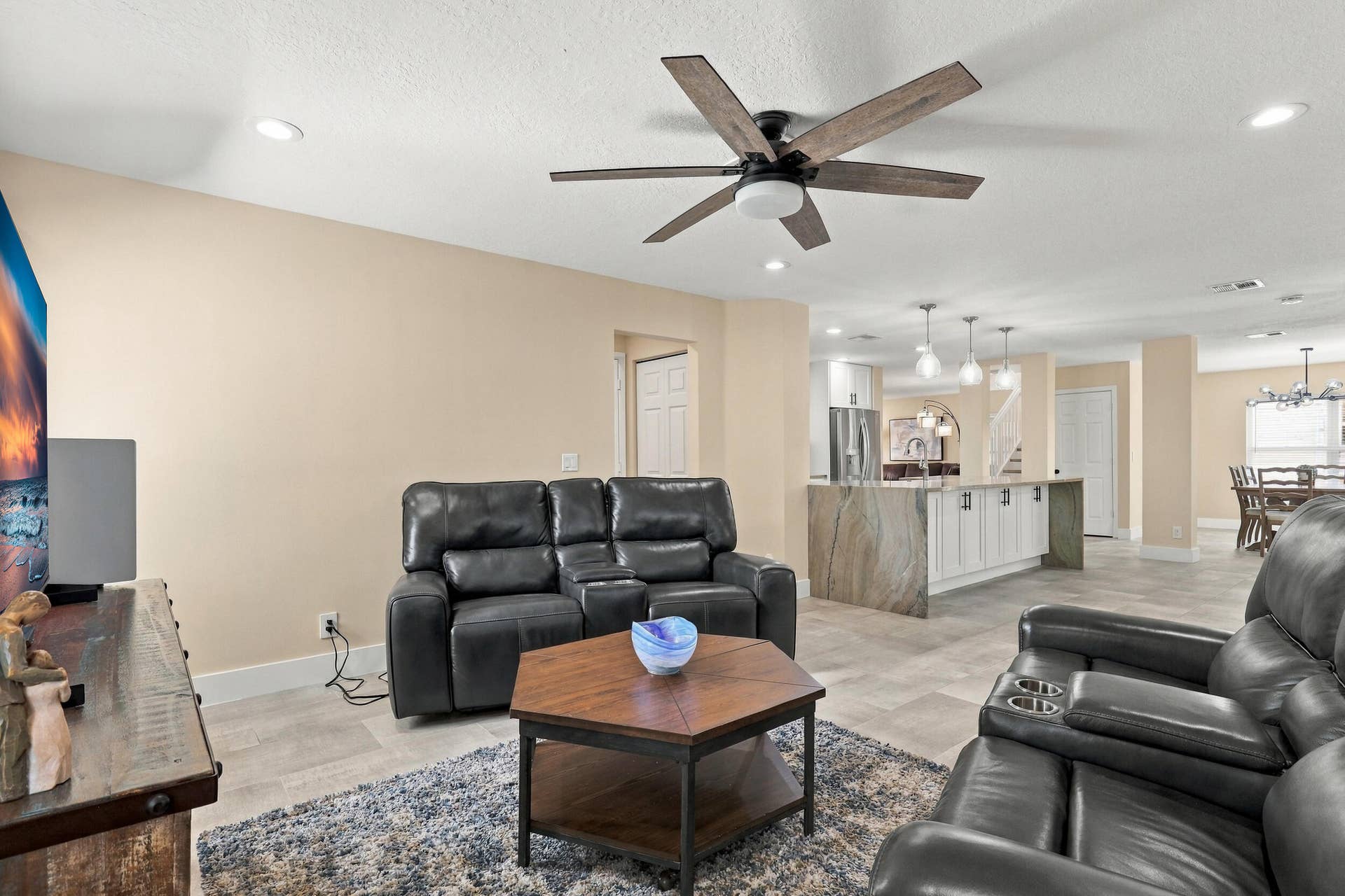 1434 Artimino Lane, Boynton Beach, FL 33436 With an elegant and versatile floor plan, this home offers two distinct living areas on either side of the kitchen, creating a circular flow to the home's layout.