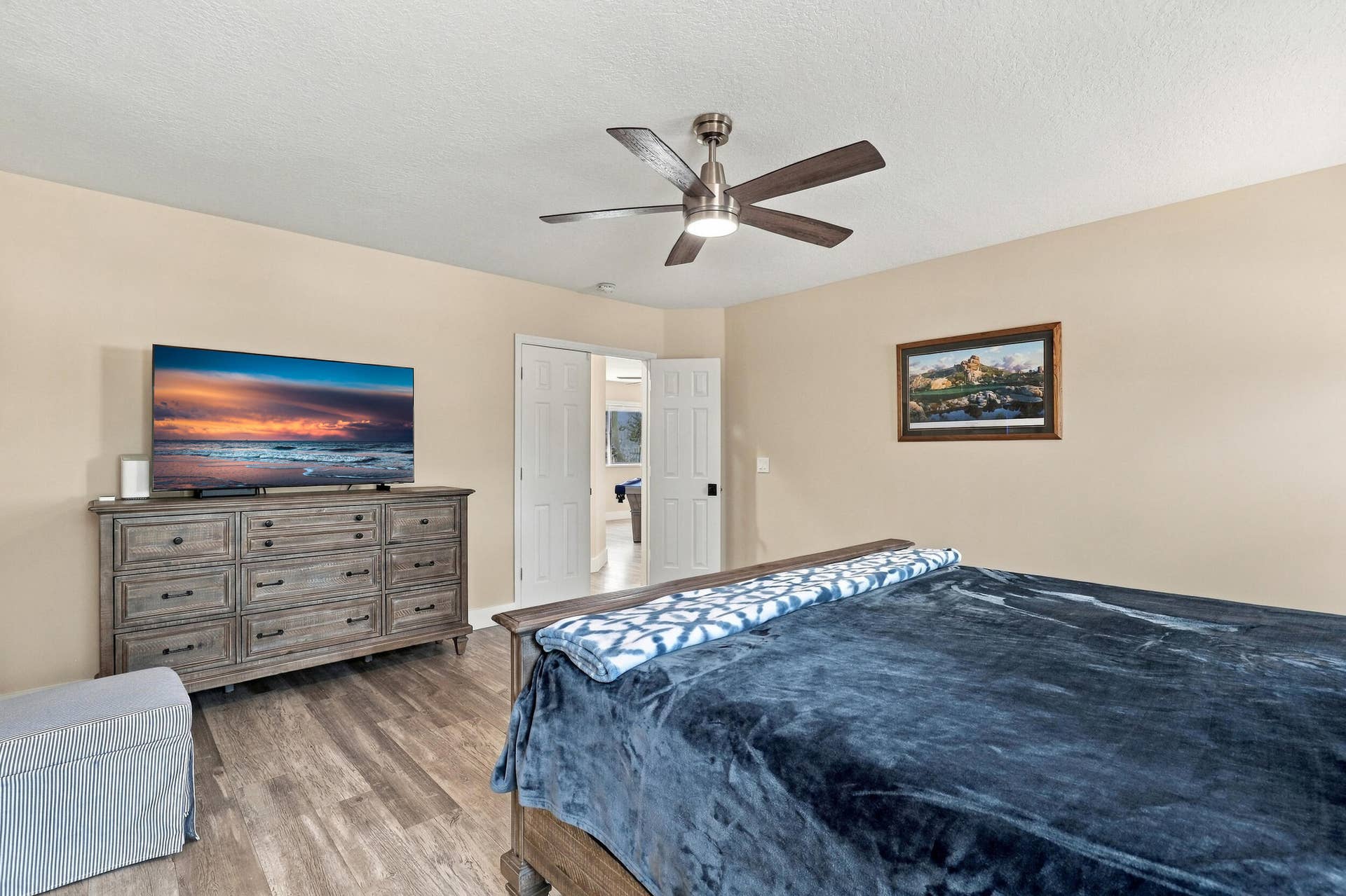 1434 Artimino Lane, Boynton Beach, FL 33436 The primary suite is enormous! It offers lots of natural light, a spa-like ensuite bathroom with a marble shower, frameless glass, as well as a walk-in closet and soaking tub.