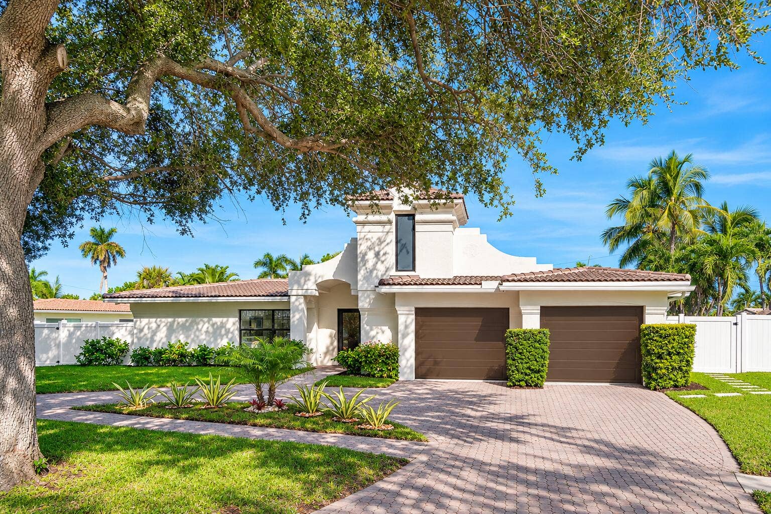 Mediterranean Home Beneath Oak Canopy