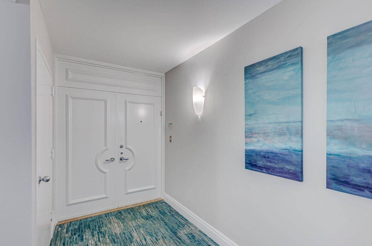 5280 N Ocean Drive, #12B, Riviera Beach, FL 33404 Beautifully bright hallways